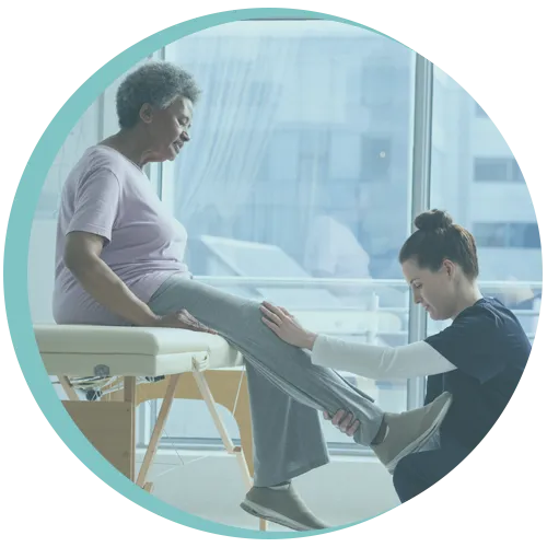 Elderly woman receiving knee physiotherapy treatment for arthritis at PhysioReform clinic London