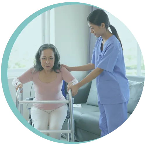 Physiotherapist assisting woman in post-operative rehabilitation